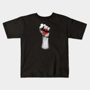 Flag of Japan on a Raised Clenched Fist Kids T-Shirt